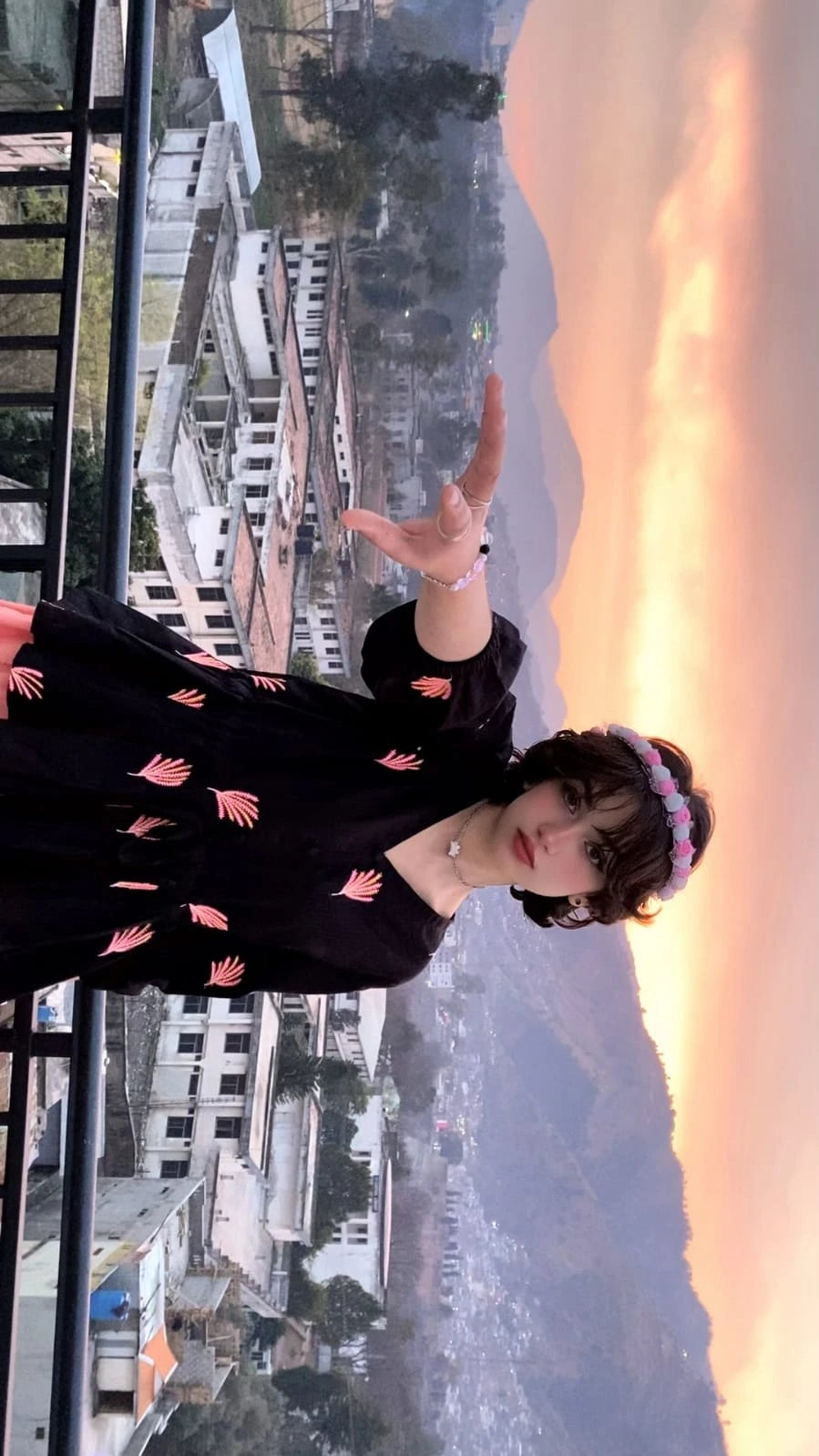 Black cotton Embroidered fusion shirt styled with a peach skirt for a fusion look