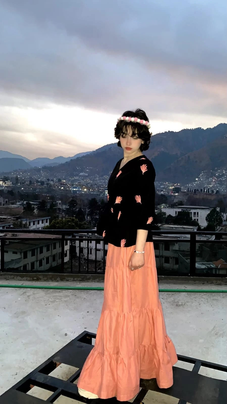 Black cotton Embroidered fusion shirt styled with a peach skirt for a fusion look