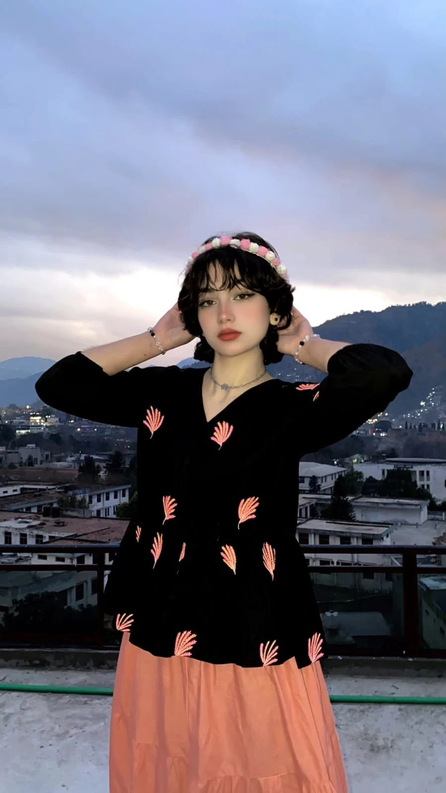 Black cotton Embroidered fusion shirt styled with a peach skirt for a fusion look